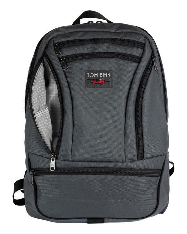 A Nebulous Grey Ballistic Synapse 25 with the side pocket open showing the Northwest Sky Halcyon lining color.